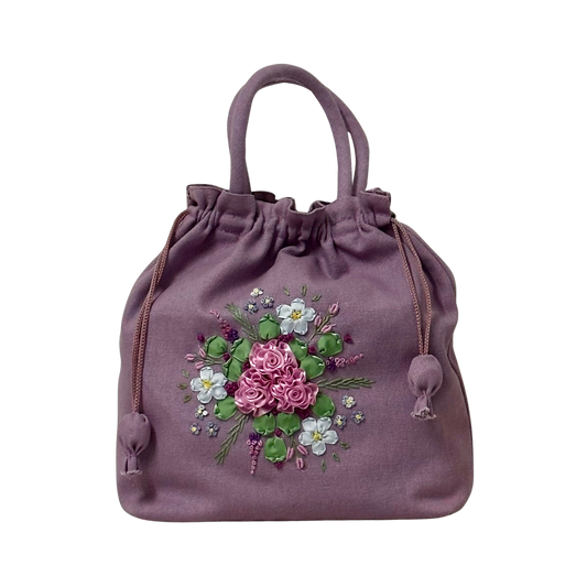 Dusty purple drawstring bag with floral embroidery