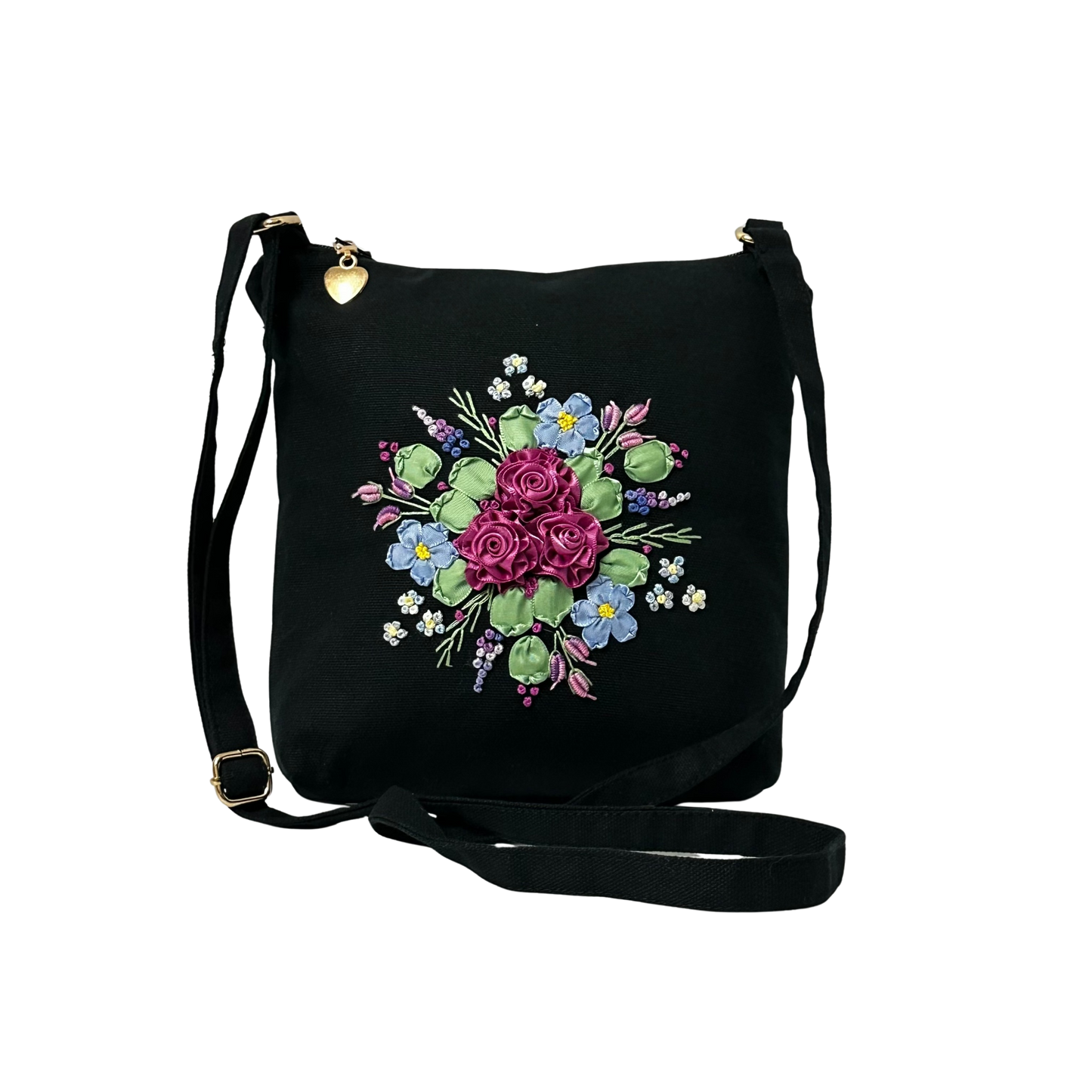 Black bag with floral embroidery on a white background