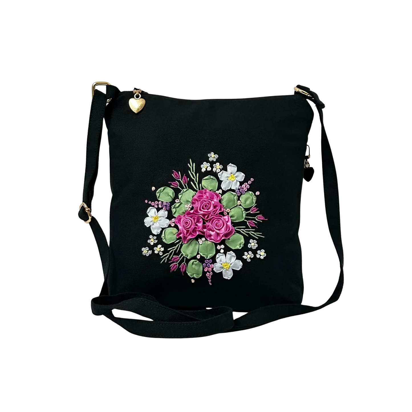 Black bag with floral design on a white background