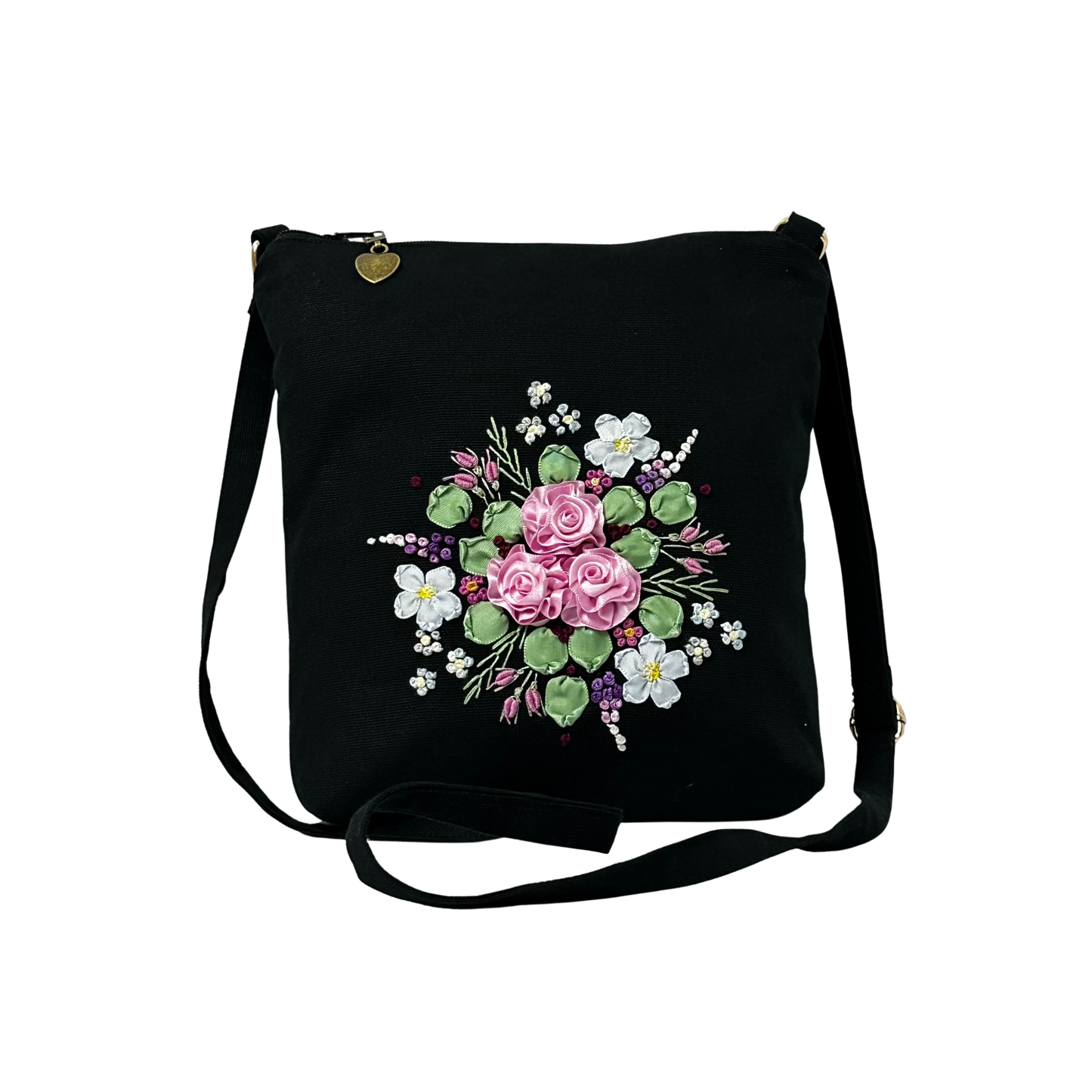 Black crossbody bag with floral design on a white background