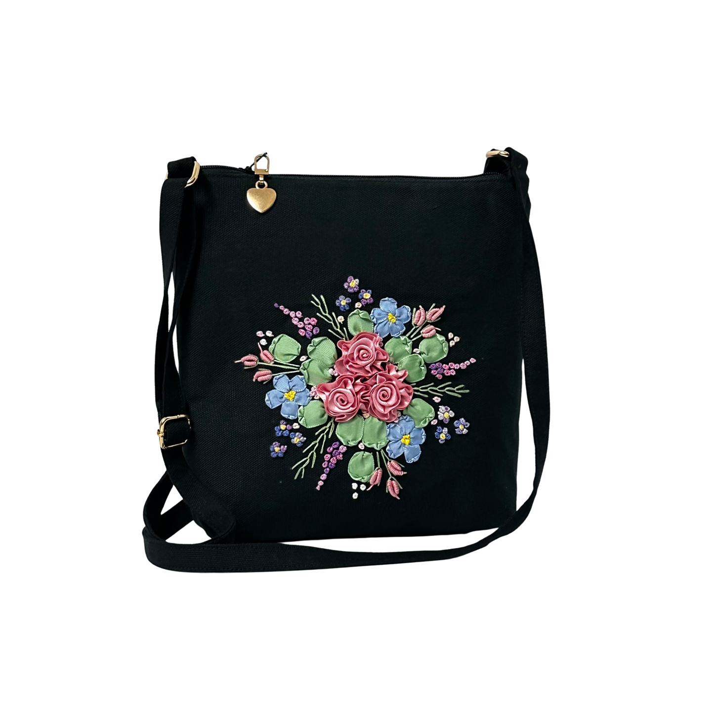 Black bag with floral design on a white background