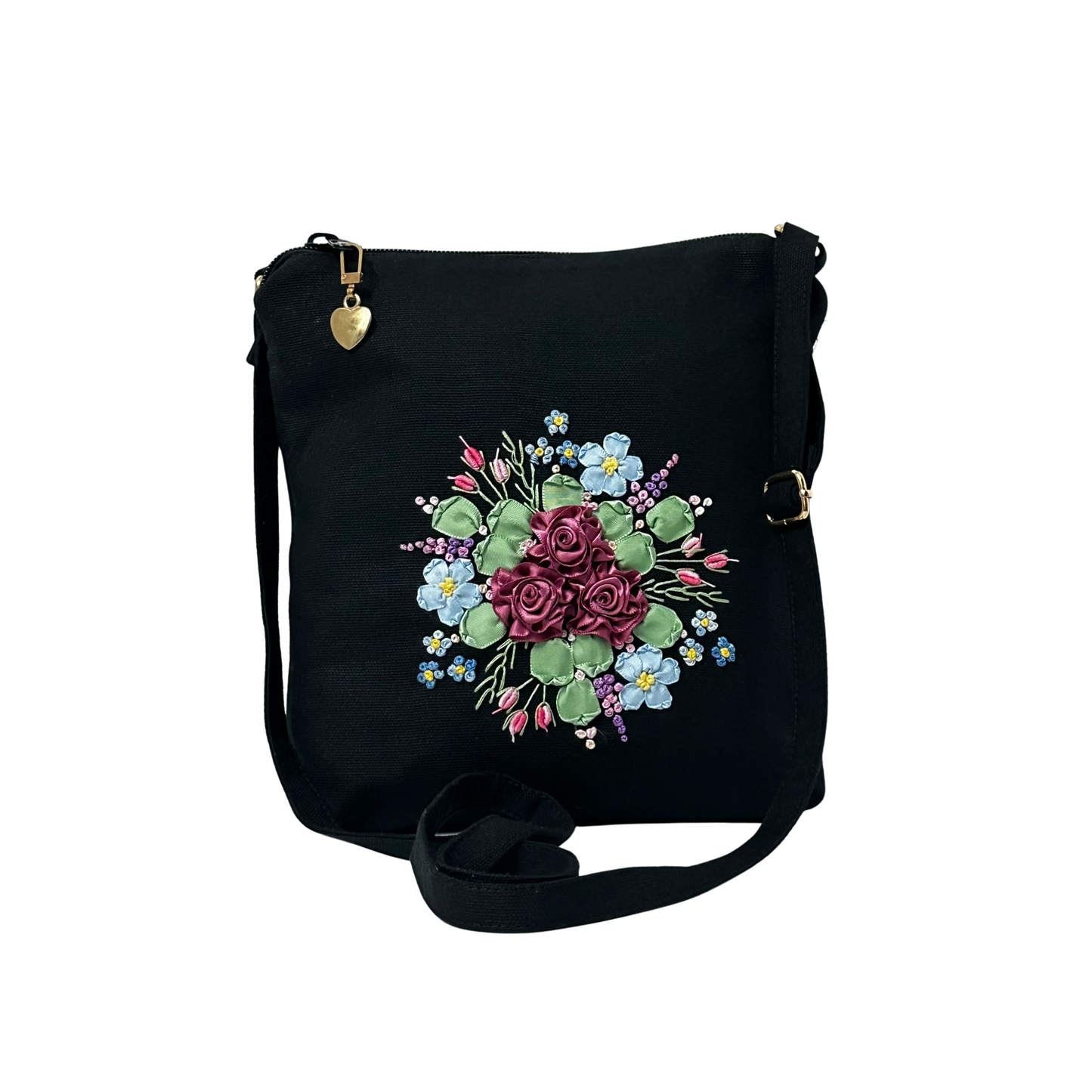 Black bag with floral design on a white background